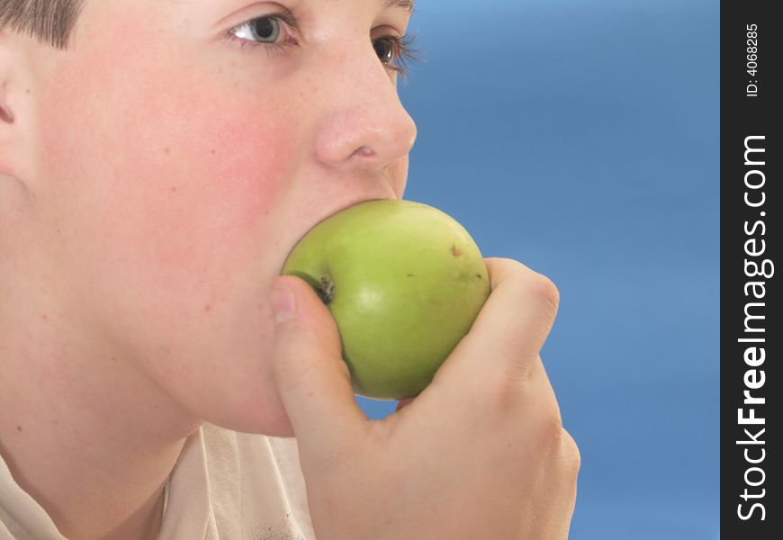 The young men eat green apple . The young men eat green apple .