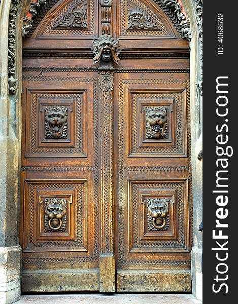 Czech Republic, Prague: ancient wood sculpted door with lion heads. Czech Republic, Prague: ancient wood sculpted door with lion heads