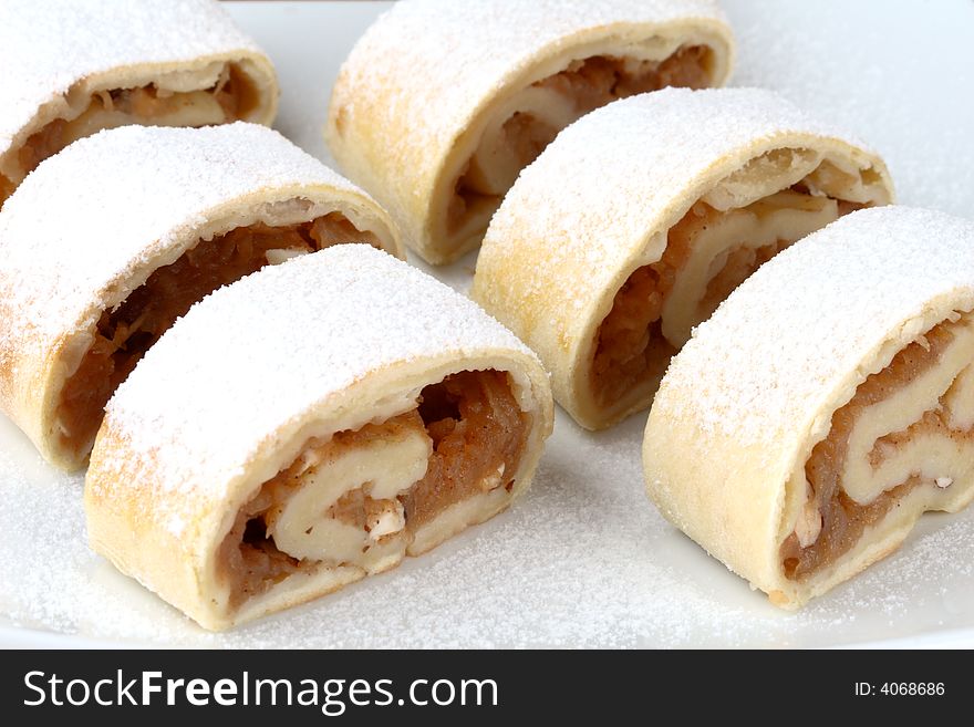 Apple roll (strudel) on a plate