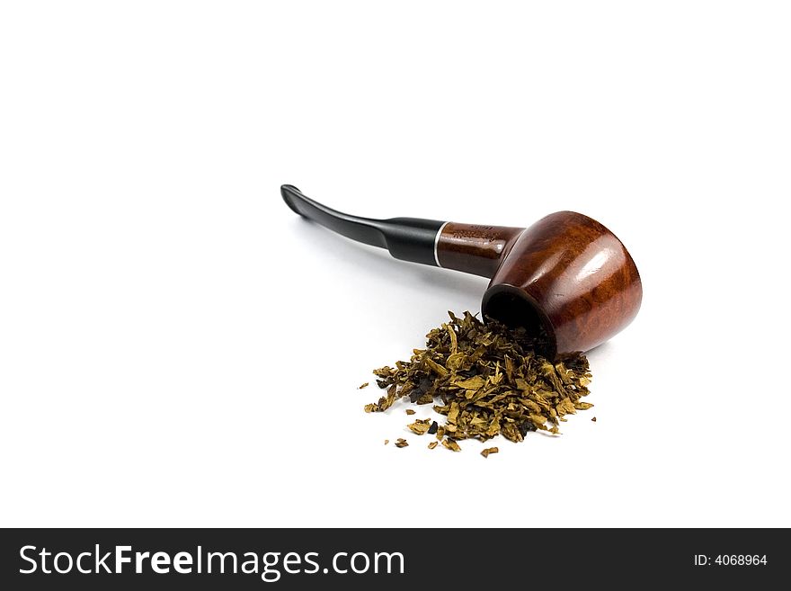 Tobacco-pipe and heap of tobacco over white background