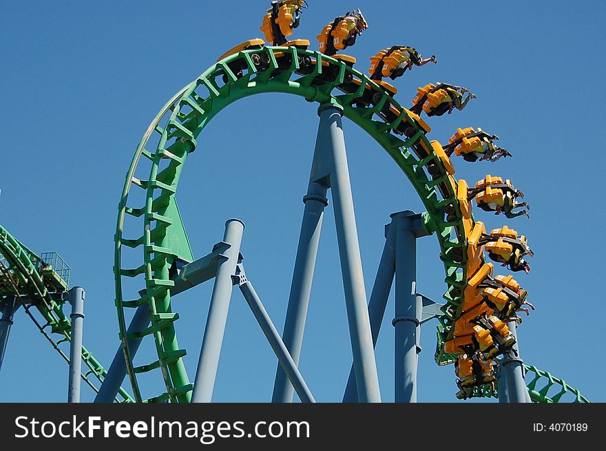 People enjoying a ride in an amusement park in Argentina. People enjoying a ride in an amusement park in Argentina
