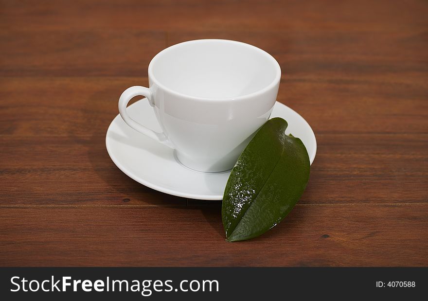 Cup of coffee on wood table. Cup of coffee on wood table