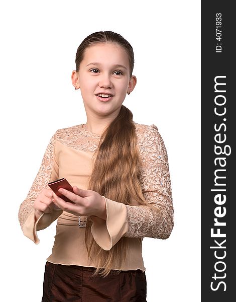 The girl the teenager with a mobile phone, on a white background. The girl the teenager with a mobile phone, on a white background.