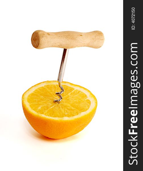 Corkscrew in a half of an orange. Corkscrew in a half of an orange