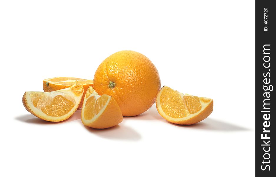 Orange and incised orange with its shadow on white background. Orange and incised orange with its shadow on white background