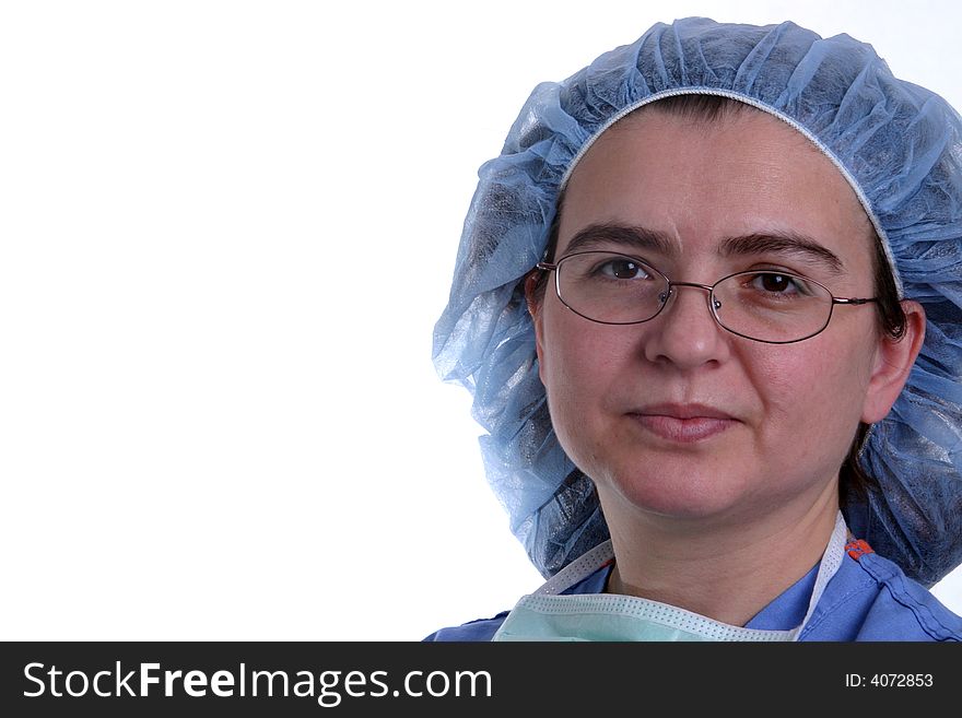 A nurse or surgeon wearing scrubs and a surgical mask on white background.