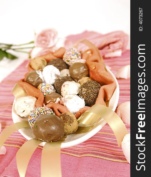 Chocolate brownie cookies served in form of little balls with romantic decoration. Chocolate brownie cookies served in form of little balls with romantic decoration