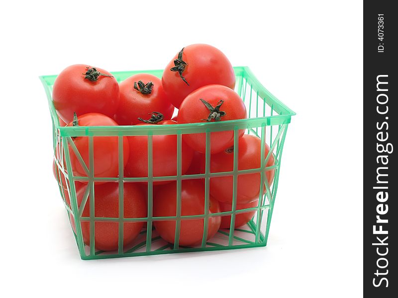Cherry tomato basket isolated on white. Cherry tomato basket isolated on white.