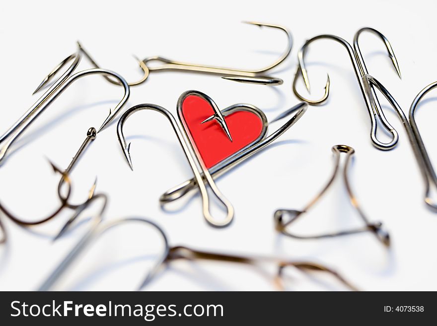 Abstract heart from hooks on a white background