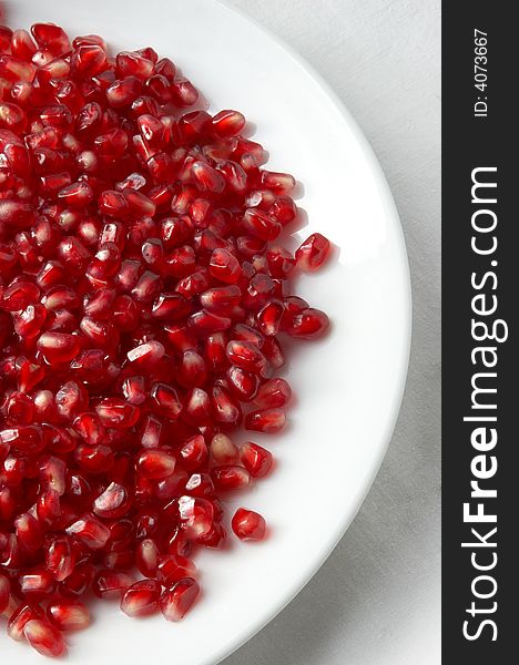 Pomegranate Seeds On The Plate