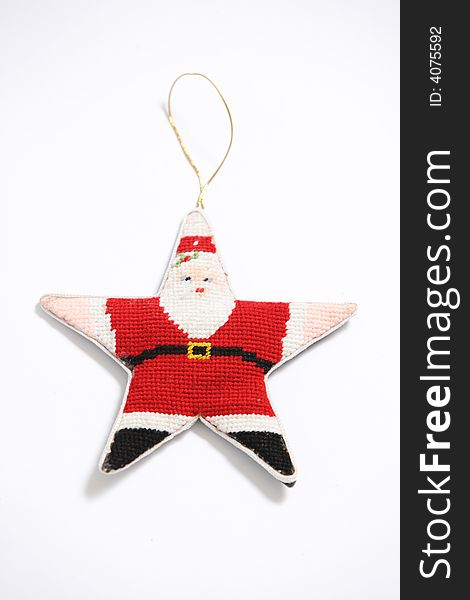 A Christmas Orniment in the shape of a Star Santa. A Christmas Orniment in the shape of a Star Santa