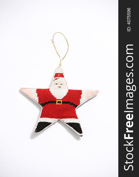 A Christmas Ornament in the shape of a Star Santa. A Christmas Ornament in the shape of a Star Santa