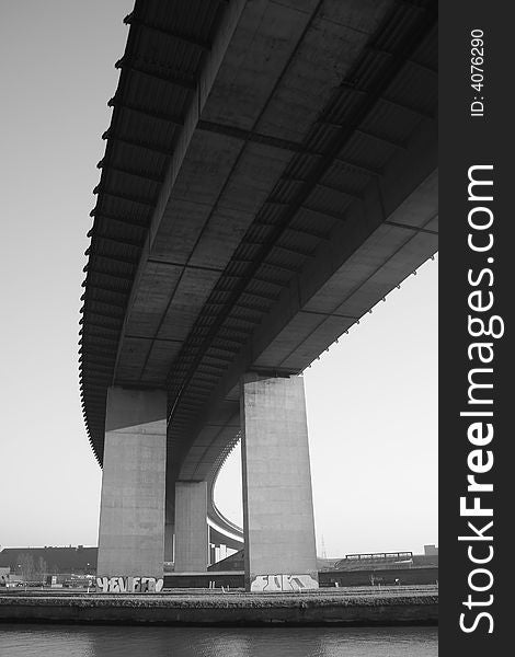 Viaduct over water in black and white colors