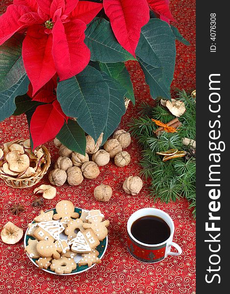 Christmas still life- cookies, walnuts, cup of coffee