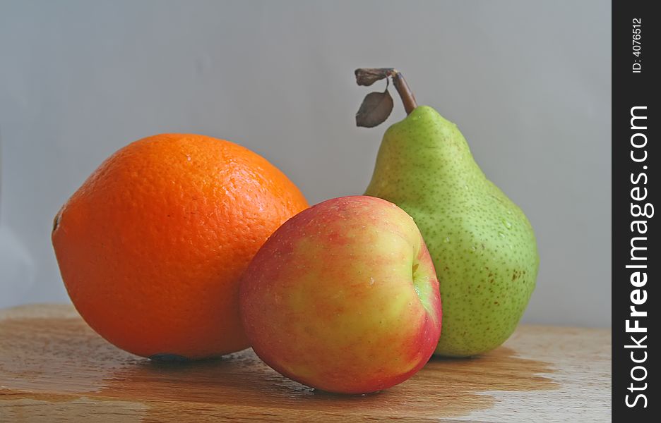 Trio of fruits on a white background