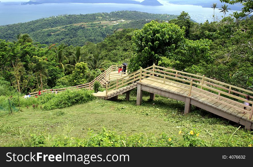 This is a wooden bridge made manually to reach other part of the mountain