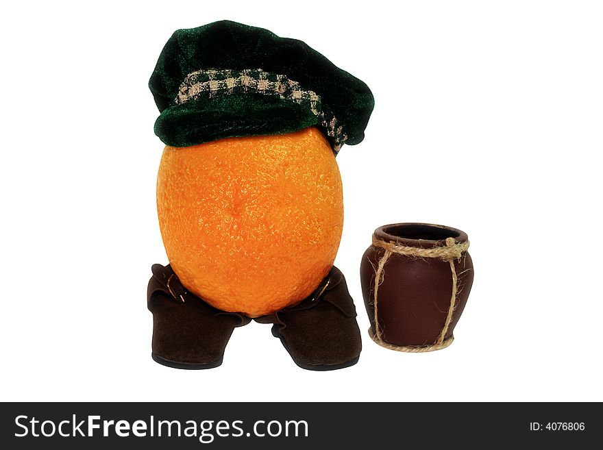 Juicy appetizing gold orange in hat and boot. Juicy appetizing gold orange in hat and boot