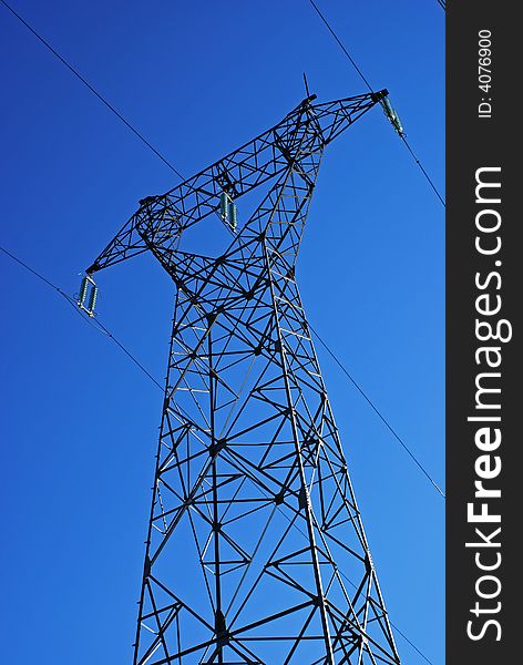 French electricity transportation over a blue sky. French electricity transportation over a blue sky