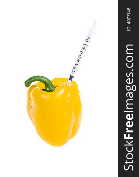 Medicine concept : Pepper with a syringe on a white background