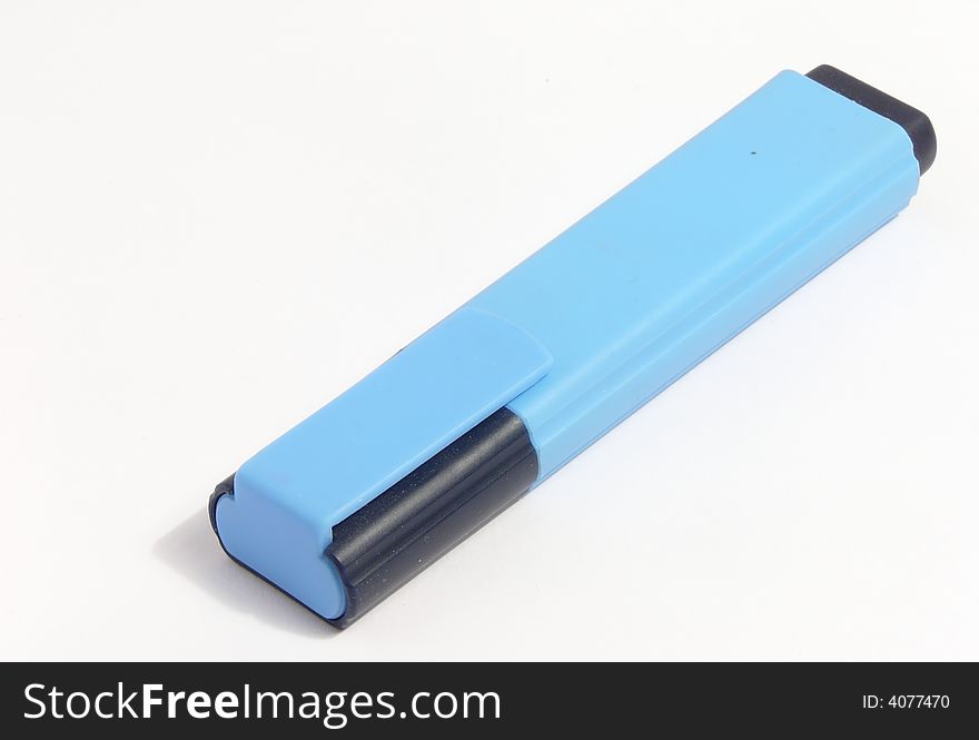 Isolated blue marker on white surfase