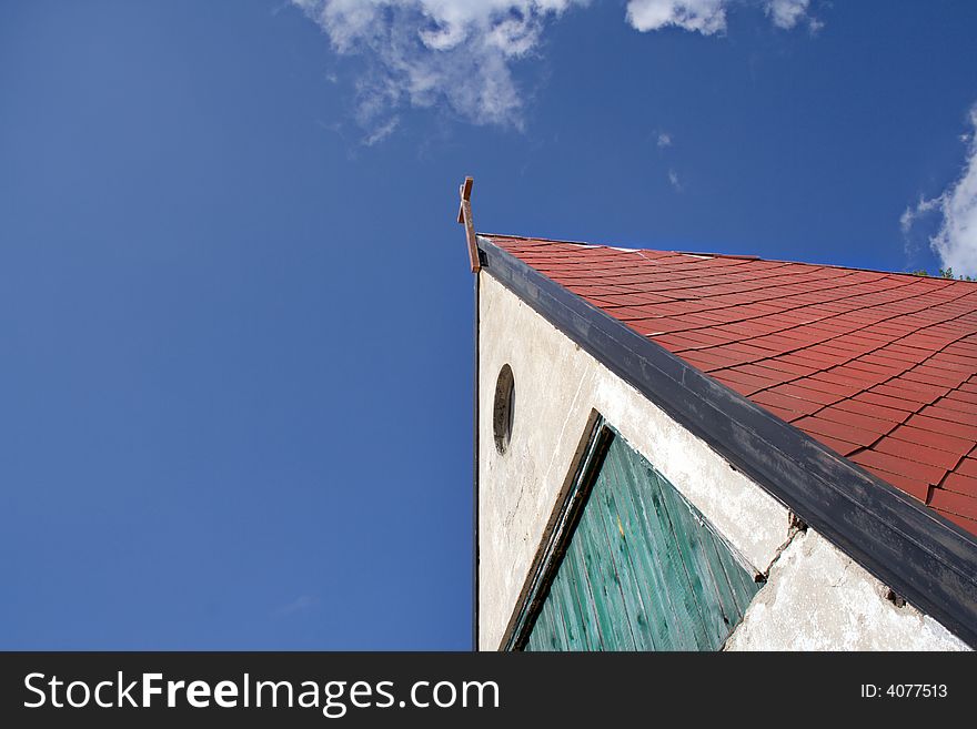 Rural mountain church detail with blue sky background. Rural mountain church detail with blue sky background