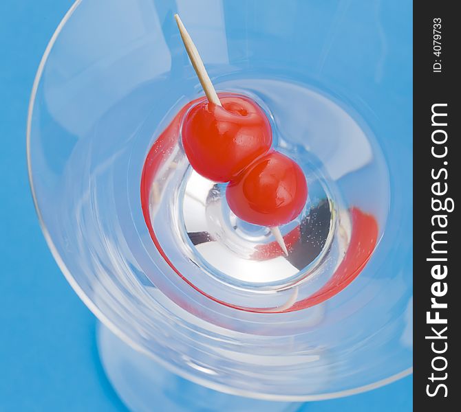 Close up of a cocktail over a blue background