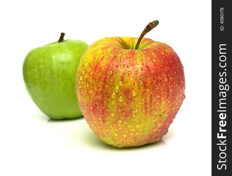 Red and green apple. Shallow DOF. Focus on a red apple.
