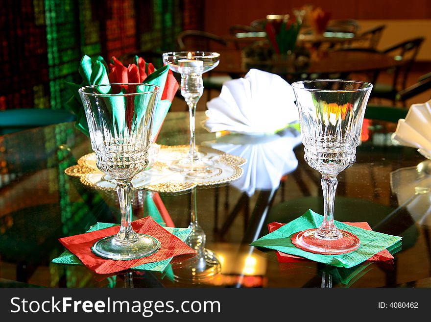 Simple resaurant setup with two glasses and candle