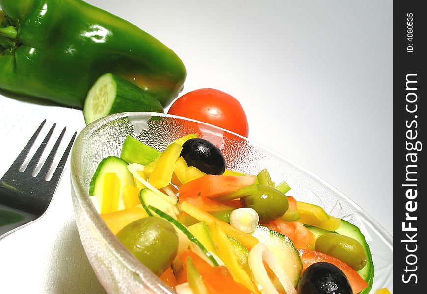 Detail fresh vegetable salad with olives