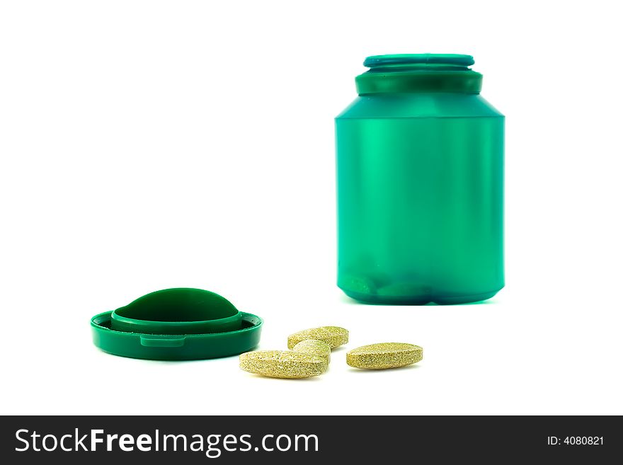 Plastic Green Bottle.. and Pills.. In White Background. Plastic Green Bottle.. and Pills.. In White Background