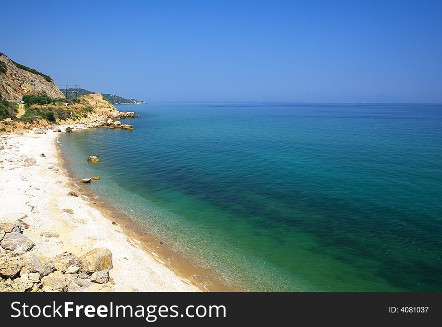 Beach with sea, sky and sand in Greece
