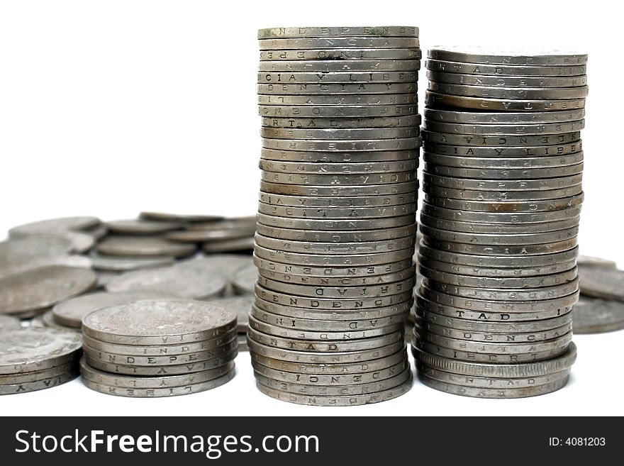 Piles of coins with white background. Piles of coins with white background