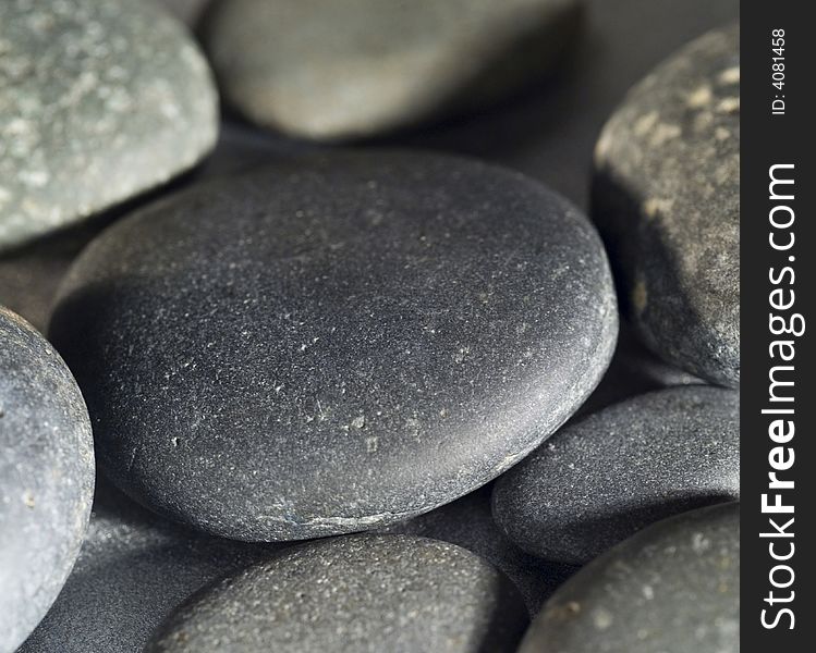 Close up of smooth rocks on a beach