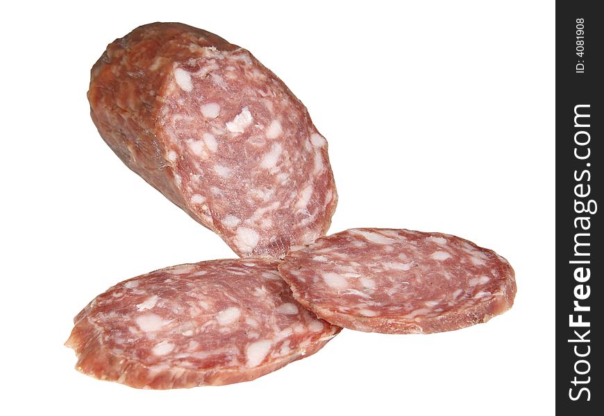 Hard salami and two slices isolated on white background