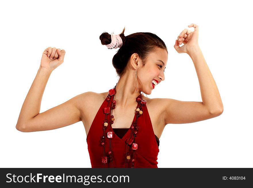 Attractive woman in red dress dancing on a white background