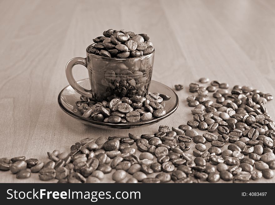 An image of coffee grains and pieces of service
