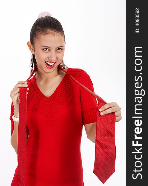 Smiling beautiful lady on red dress holding necktie. Smiling beautiful lady on red dress holding necktie