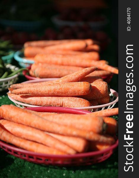 Baskets of carrots at the farmer's market