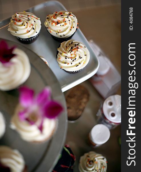 Fancy cupcakes with orchid blossoms