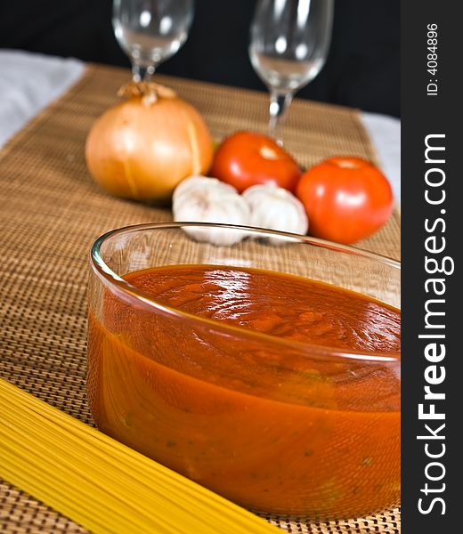 Spaghetti sauce in a bowl with other ingredients. Spaghetti sauce in a bowl with other ingredients