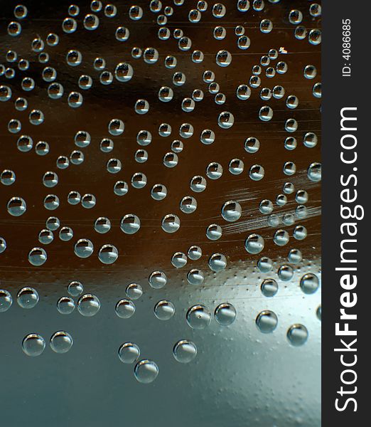 Bubbles inside liquid on dark background