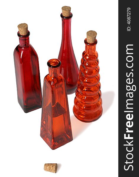 Red kitchen decorative bottles isolated. Red kitchen decorative bottles isolated