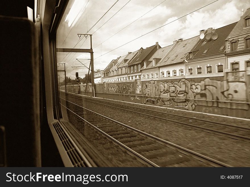 A picture taken from a moving train, outside koln. A picture taken from a moving train, outside koln.