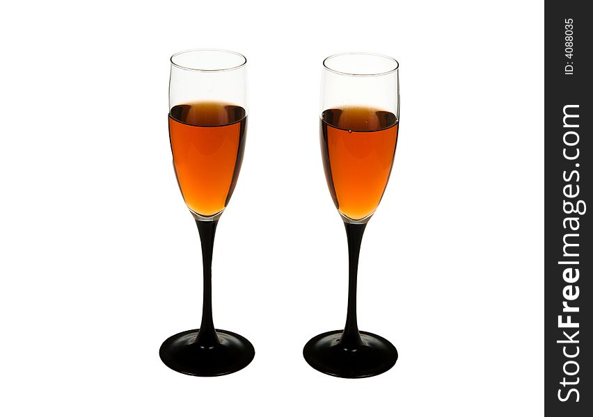 Two wine glasses with wine on a white background