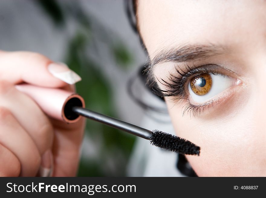 Young woman directs a make-up in the morning. Young woman directs a make-up in the morning