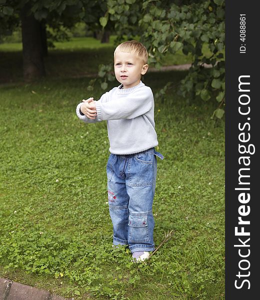 Child plays in the park. Child plays in the park