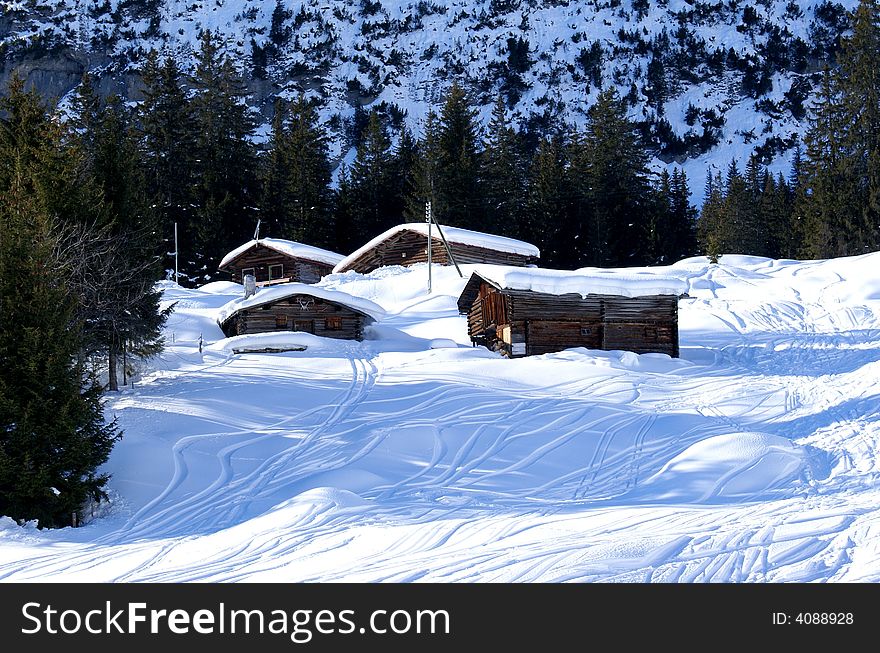 Sheds beside the slope in a ski resort in the east part of Switzerland.