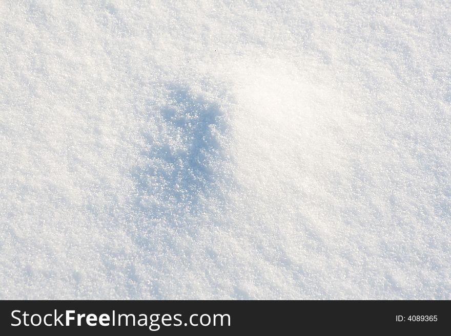 Fresh snow sparkle in the sun. Snow background.