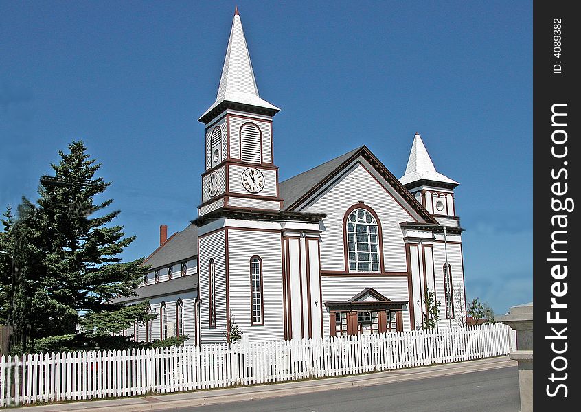 Coastal Church With White Steeples