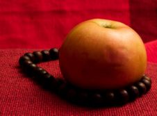 Red Apple Prayer Beads Stock Image